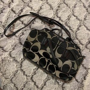 Black and Tan monogrammed Coach cross body bag